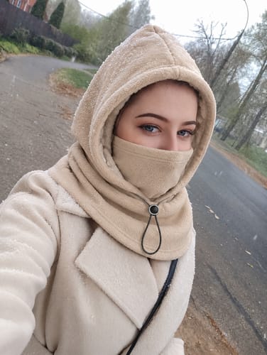 Customer wearing beige winter hood